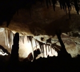 Stalagmites and stalactites inside the Cave of the Winds Colorado