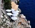 Impressive-looking Buža bar atop a cliff at the southern side of the Dubrovnik walls