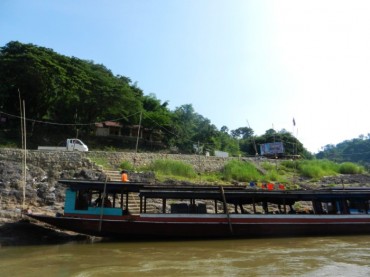 Crossing from Thailand to Laos by boat at the Mekong River