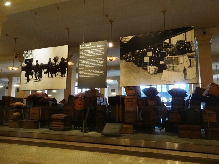 The bags of the immigrants are welcoming the visitors of Ellis Island New York