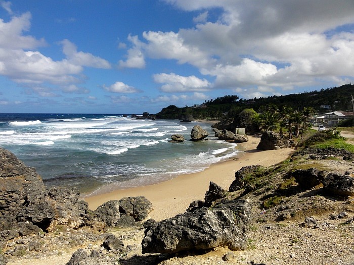 Rugged coast of Bathscheba beach facing dark blue Atlantic ocean.