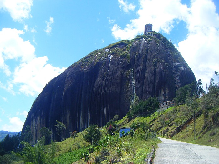 Peñon de Guatapé, big rock near Medellin (top view upon gorgeous artificial lakes…after climbing the artisanal stairs you see on the right)