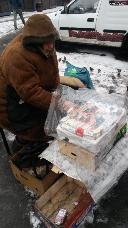 an old woman selling cigarettes at Kontraktova.