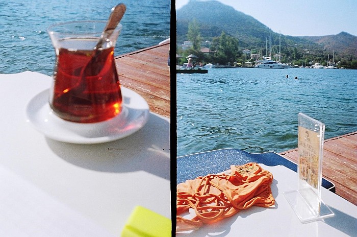In this photo I'm enjoying my tea by the seaside on the dock in Selimiye