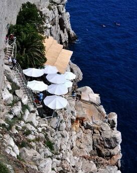 Impressive-looking Buža bar atop a cliff at the southern side of the Dubrovnik walls
