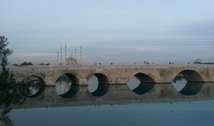 Taş Köprü ( Stone Bridge) with the view of Merkez Cami ( Central Mosque) behind. Seyhan, Central Adana.